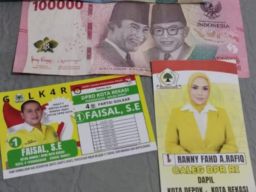 Caleg Golkar Dilaporkan Bagi-Bagi Amplop, ETOS Indonesia Desak Bawaslu Segara bertindak